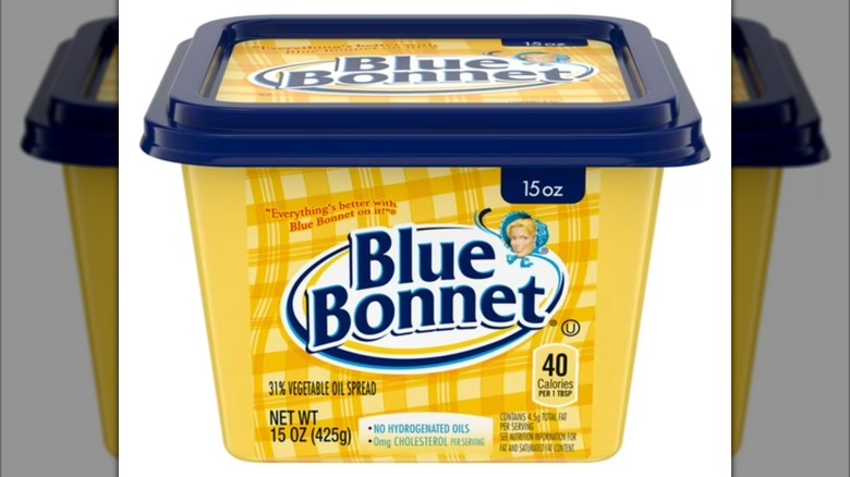 A tub of Blue Bonnet Vegetable Oil Spread on a white background
