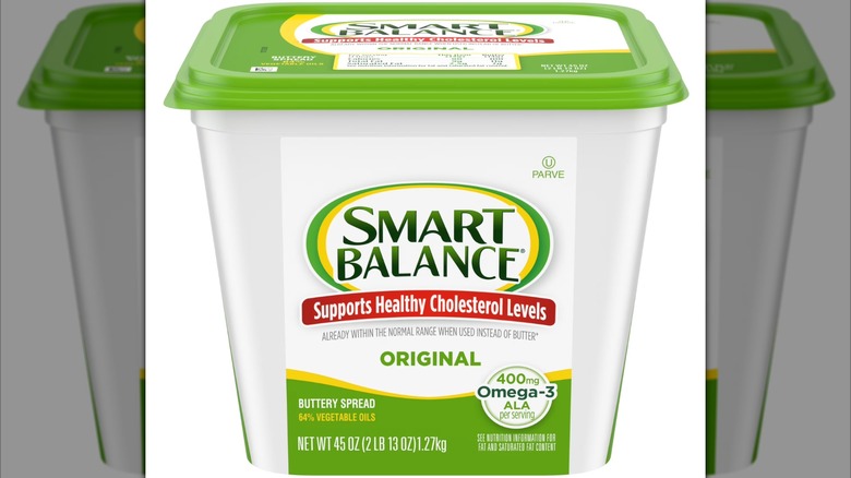 A tub of Smart Balance Original Buttery Spread on a white background