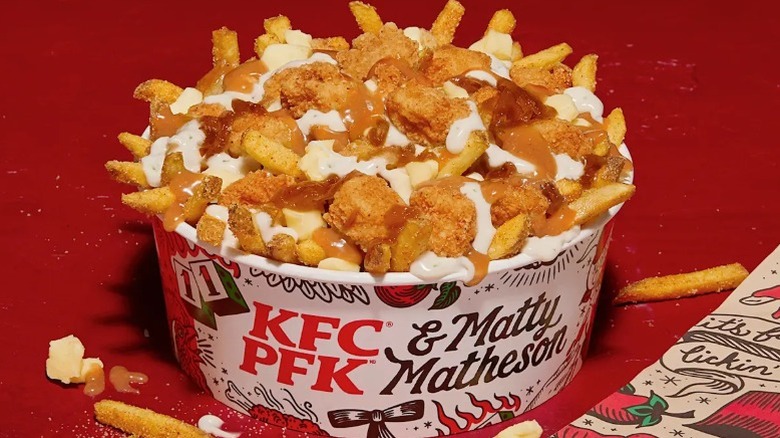 KFC Matty Mega Melt Poutine dish with fries, cheese curds, and chicken popcorn