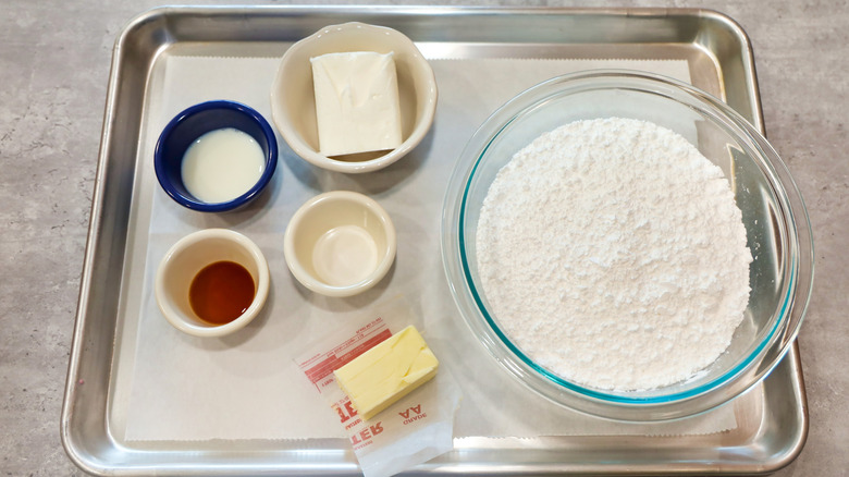 Buttercream frosting ingredients on tray with shortening