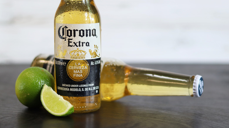 Bottles of Corona with lime wedges