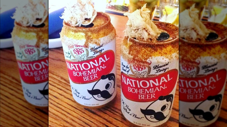 National Bohemian Beer cans with Old Bay and crab meat