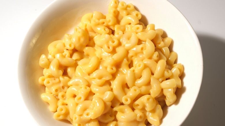 Creamy macaroni and cheese in white bowl
