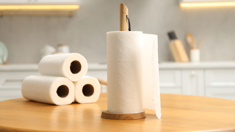 Rolls of paper towel on kitchen counter