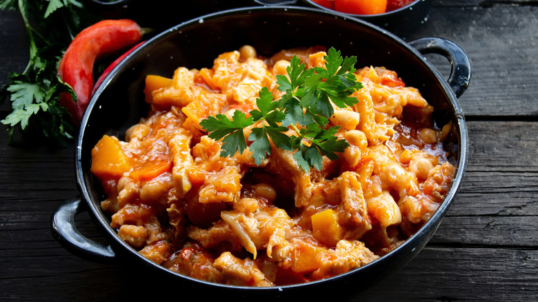 Chickpea and vegetable casserole in round bowl