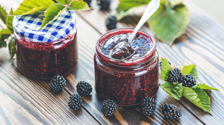 jars of jam with blackberries