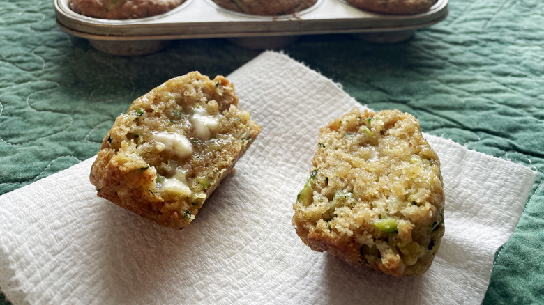 Split muffin with butter on a napkin