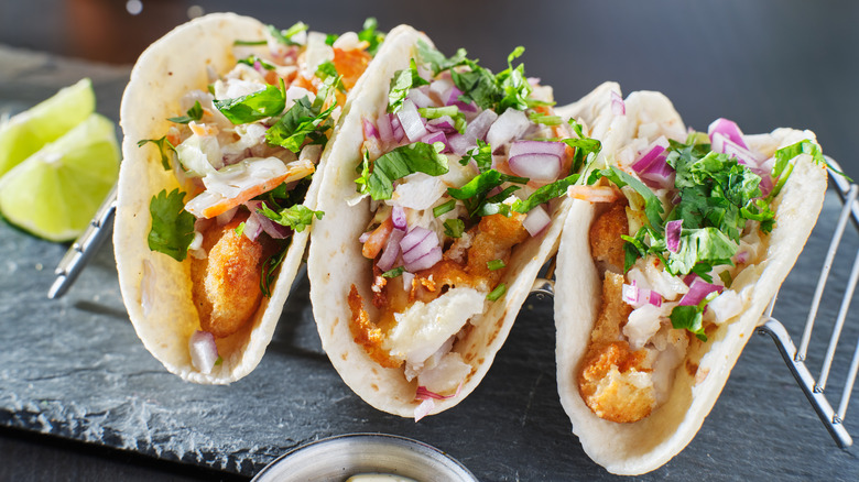 fish tacos topped with cilantro