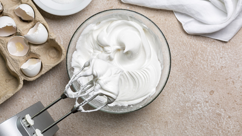 Whipped egg whites in a bowl