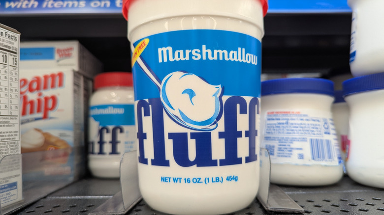 container of marshmallow fluff on store shelf