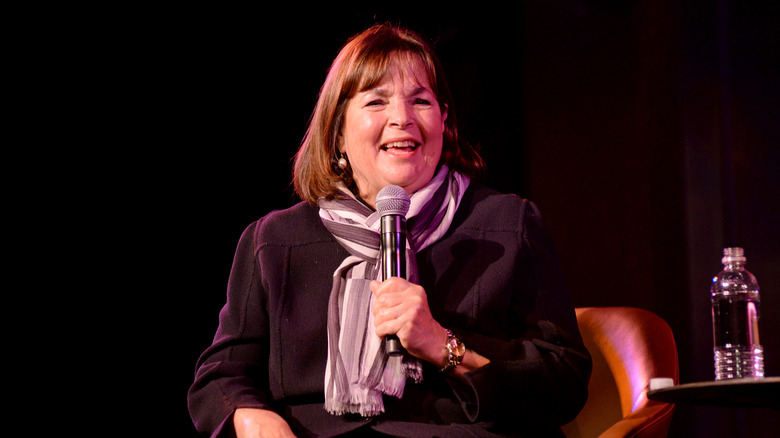 Ina Garten smiling and talking into a microphone