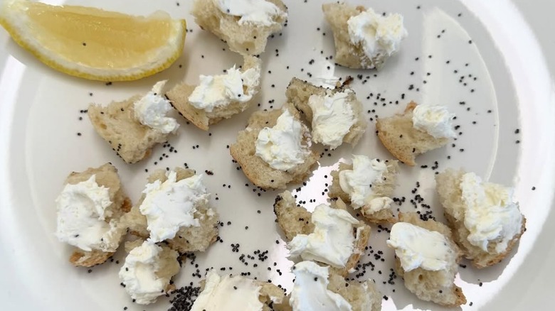 ripped up bagel with modicums of cream cheese