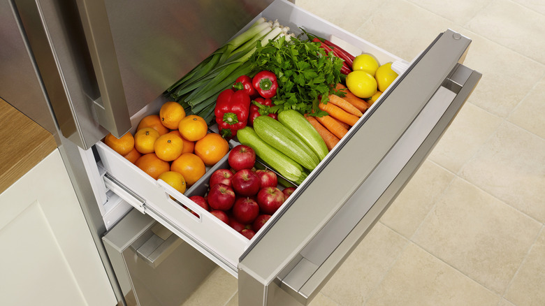Undercounter fridge drawer filled with produce