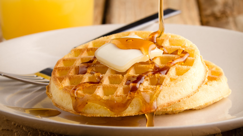 Waffles with butter and syrup