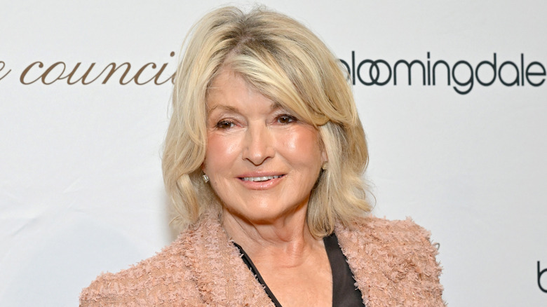 Martha Stewart in pink jacket, smiling