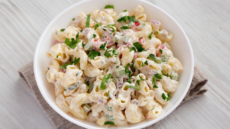 creamy pasta salad with parsley garnish