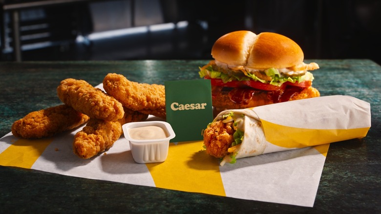 McDonald's Caesar lineup with sauce, sandwich, and wrap