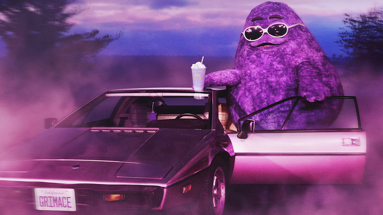 Grimace in purple car with Grimace Shake 