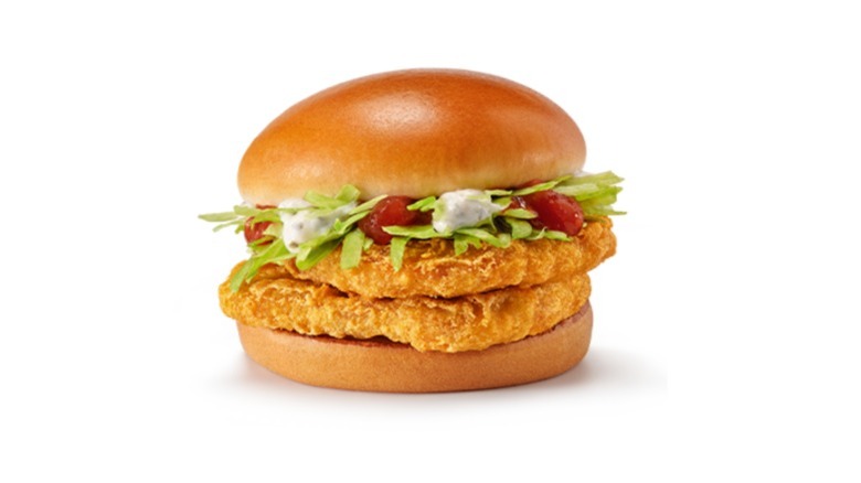 A McDonald's Le McDeal Poulet sandwich with a white background