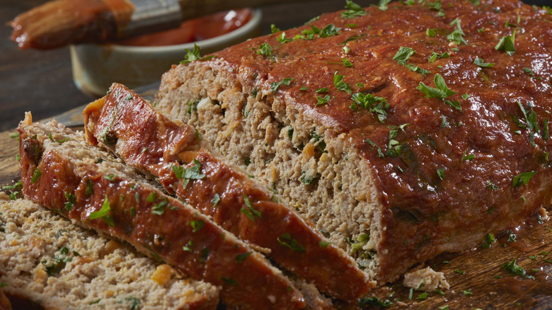 sliced meatloaf with herbs