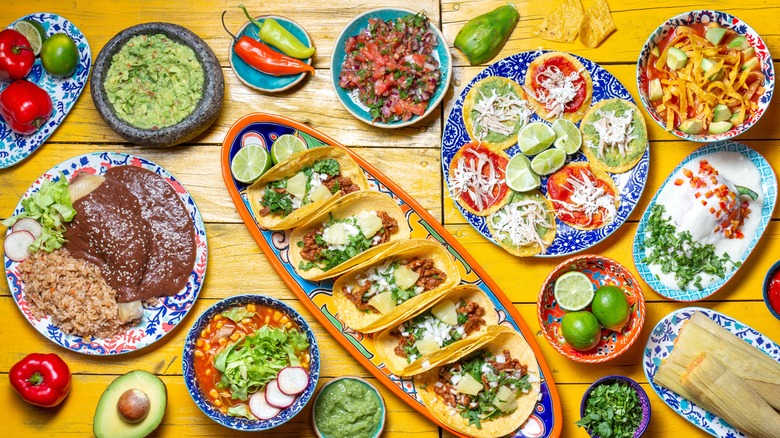 Traditional Mexican food spread out on a table