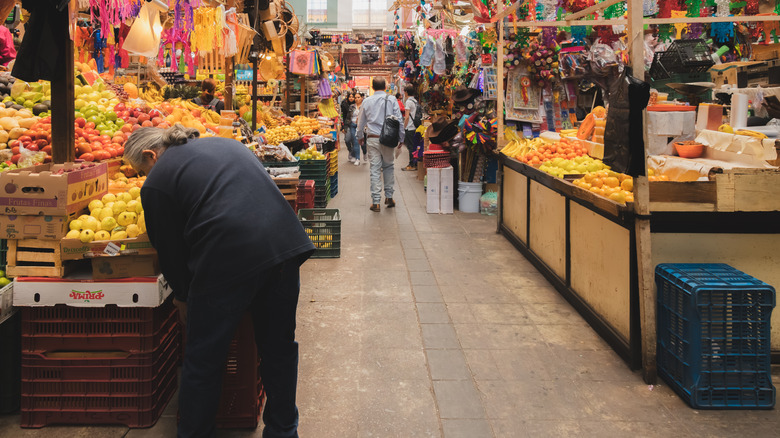 A young woman shopping a Mexican supermarket