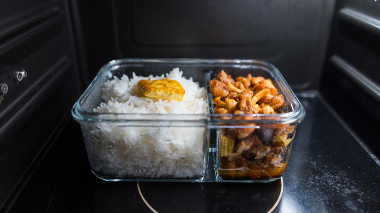 Glass container of food in microwave