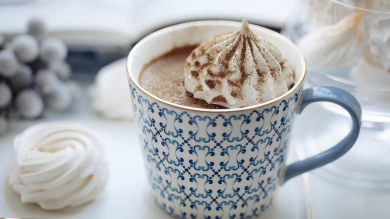 mug of hot chocolate withfwhipped cream on top