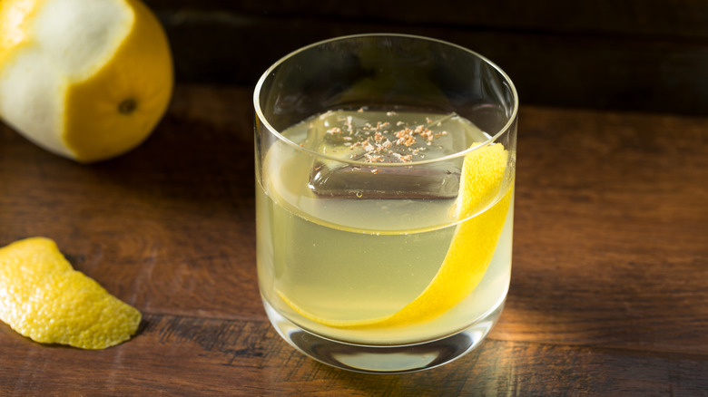 milk punch cocktail lemon garnish