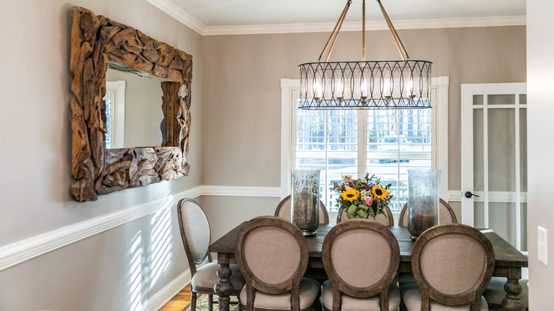 large mirror in small dining room