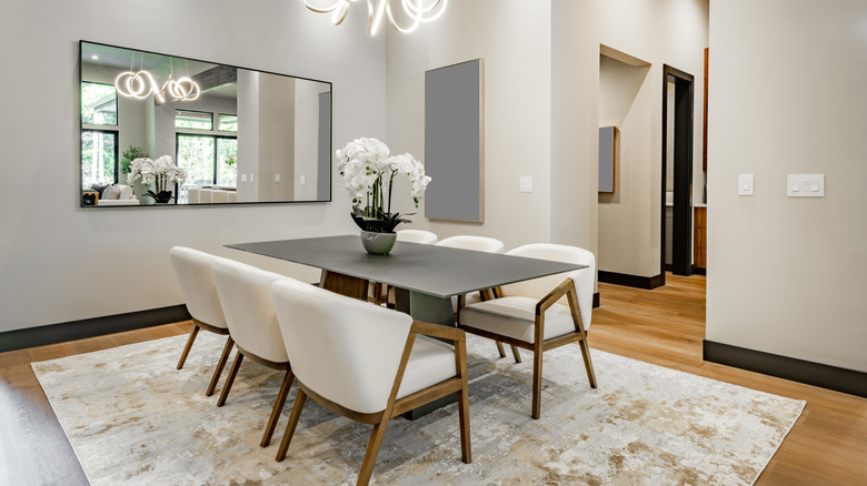 Dining room with a large mirror