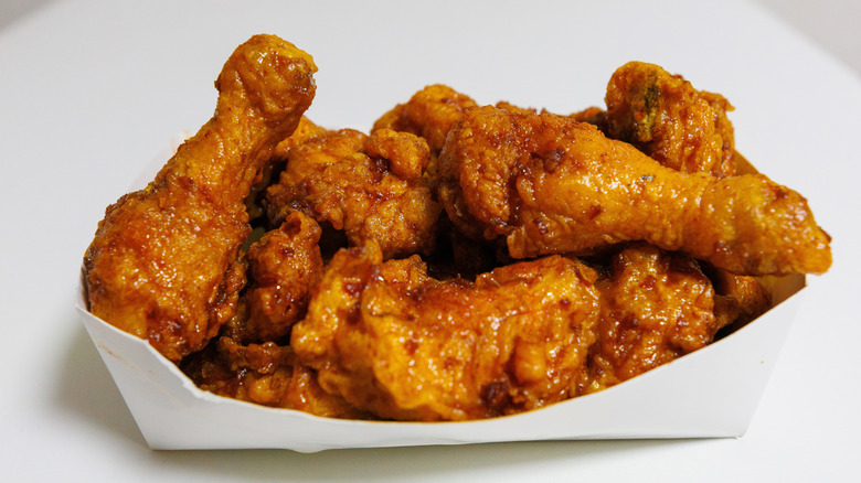 Chicken wings in a paper container