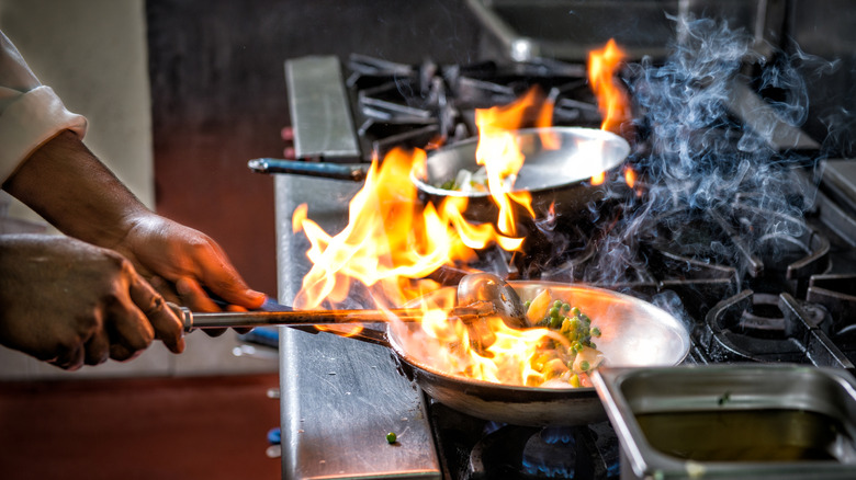 food flambeing in frying pan