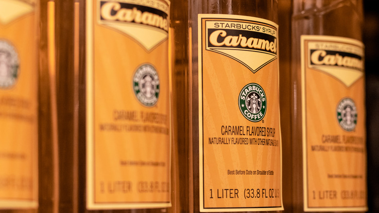 Row of Starbucks caramel syrup bottles