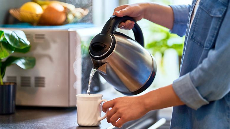 steaming water being poured