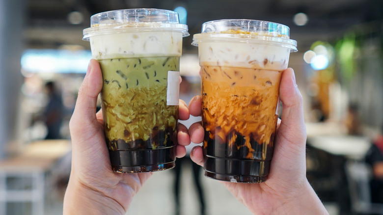 Green and black boba tea