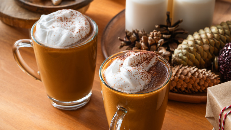 Two mugs of pumpkin spice latte