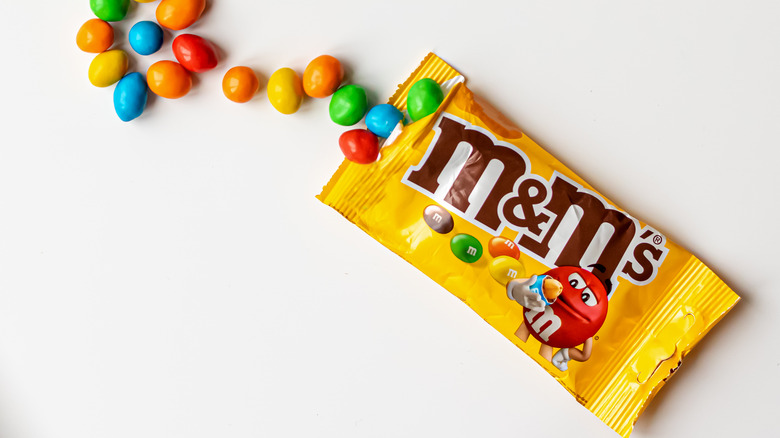 An m&m package on a whit background