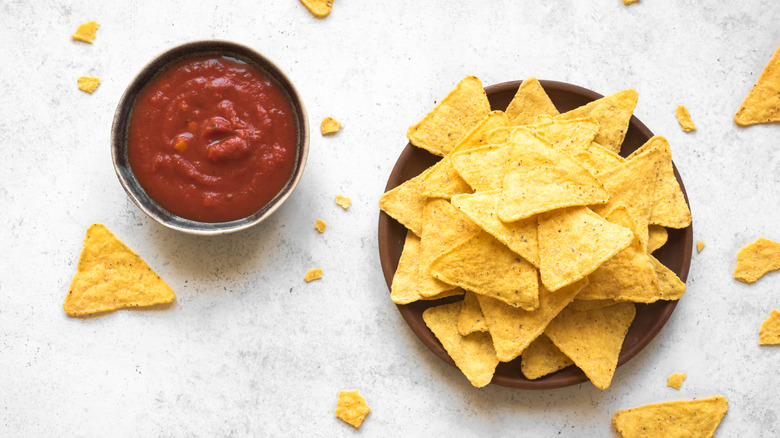 Moe's chips, guac, queso, and salsa