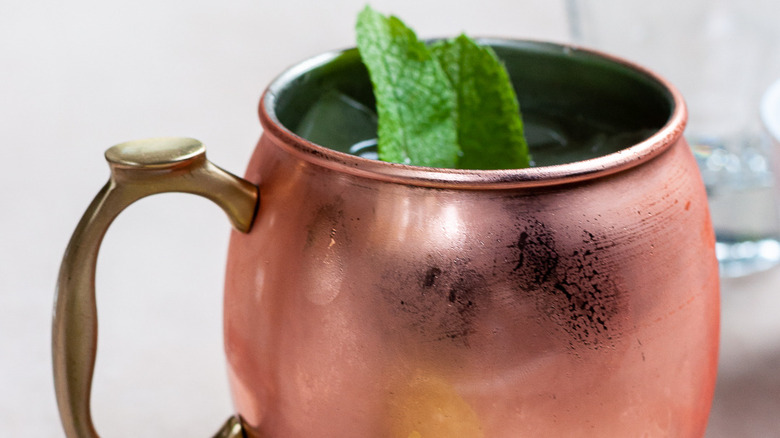 copper mug with mint garnish