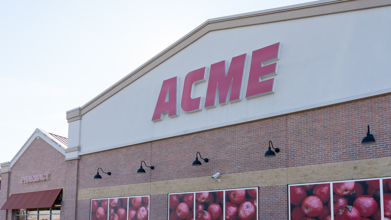ACME storefront on a brick and white building