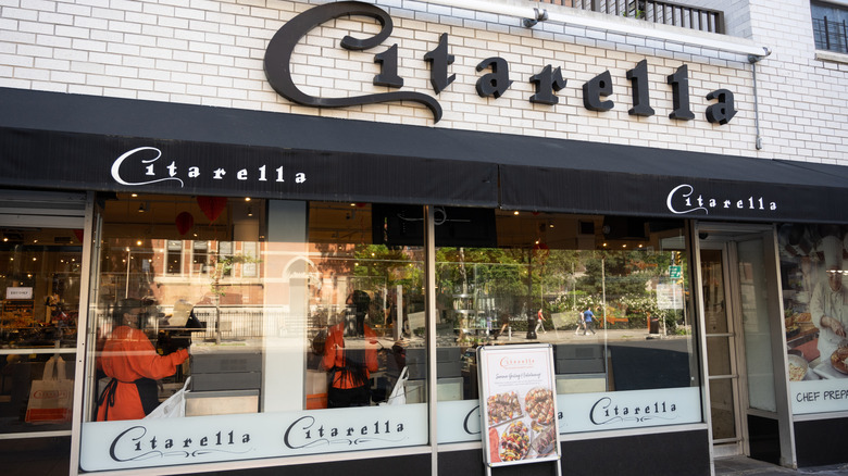 A glass window storefront of a Citarella store
