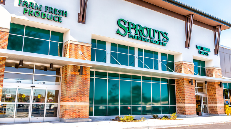 The brick and white exterior of a Sprouts Farmers Market location