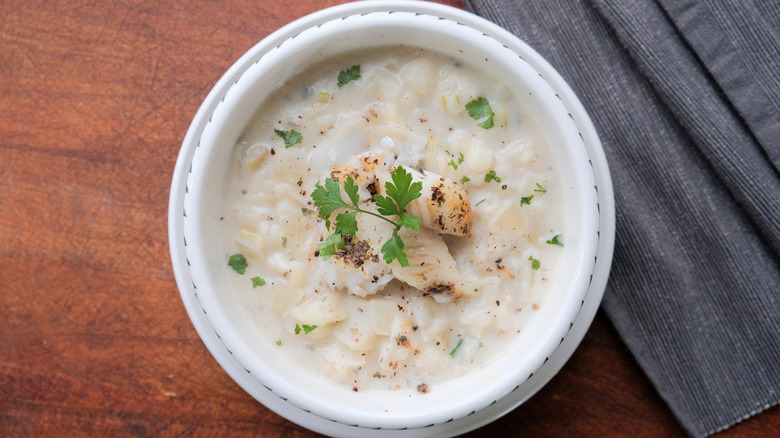 White bowl of haddock chowder
