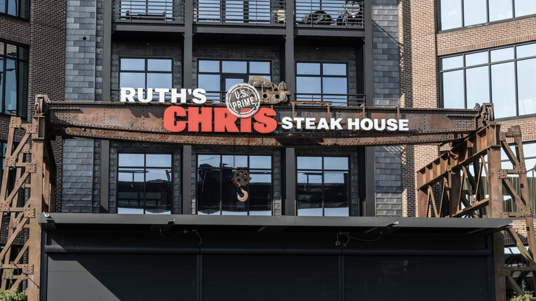 The exterior sign of a Ruth's Chris Steak House location during the daytime