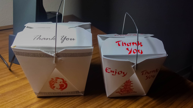 two Chinese takeout boxes with metal handles