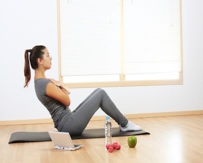 Girl exercising with a healthy snack