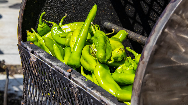 hatch chiles are loaded into roaster
