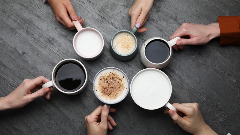 various types of coffee in mugs