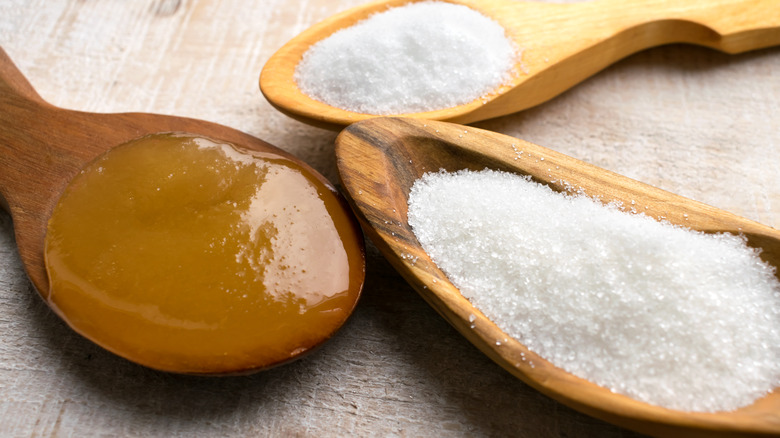 Three spoons with artificial sweetener